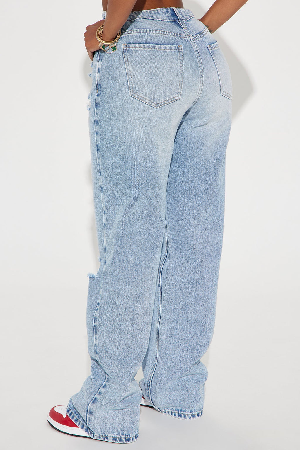 Wondering Why Ripped Straight Leg Jeans